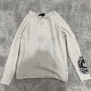 Gray Sweater with Floral Sleeve Detail and skull design on back